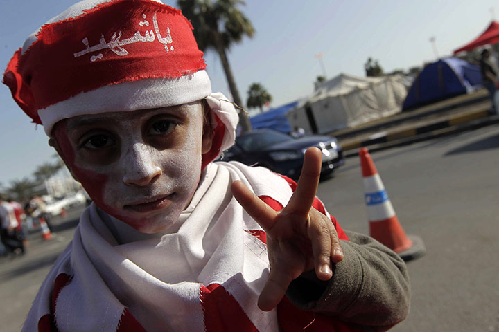 Arab protests: Manama, Bahrain: A young anti-government protester wearing a headband