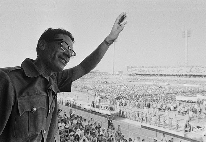 Muammar Gaddafi : July 1973: Muammar Gaddafi waves to demonstrators gathered in Benghazi