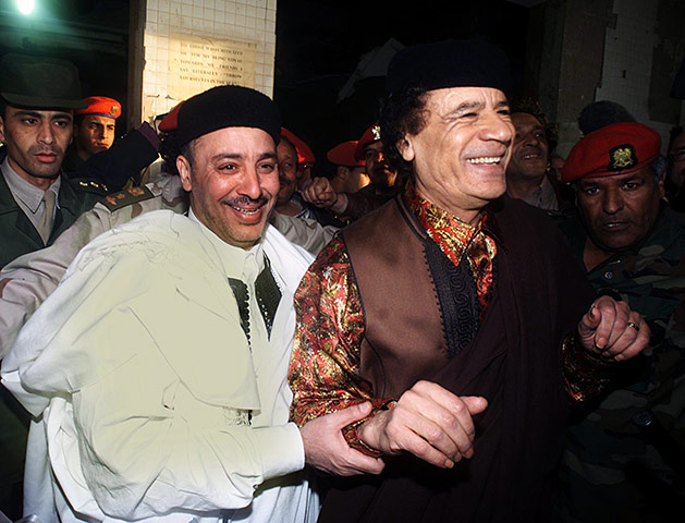 Muammar Gaddafi : February 2001: Muammar Gaddafi with Lamen Khalifa Fhimah