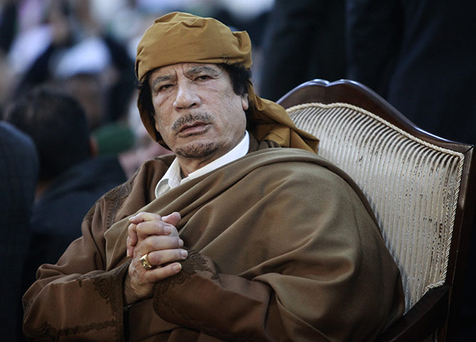 Muammar Gaddafi: February 13, 2011: Libyan leader Muammar Gaddafi attends a ceremony