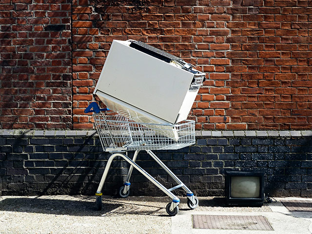 in pictures: broken: abandoned fridge in trolley