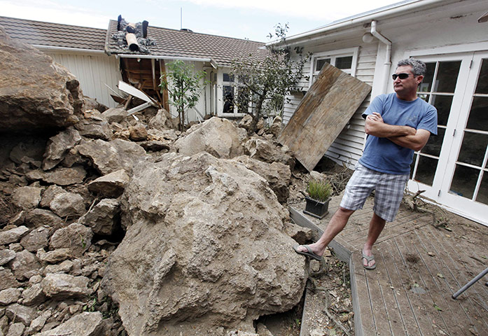 Christchurch earthquake: Tony Christie stands among rubble in his backyard in the suburb of Sumner