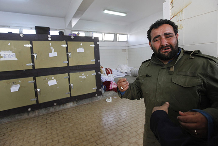 libya: A man mourns his brother in benghazi