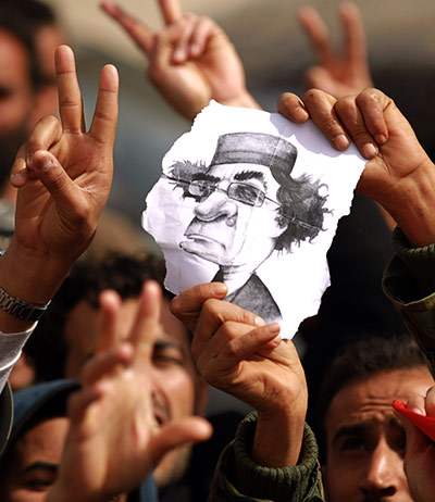 libya unrest: Libyan protesters flash 