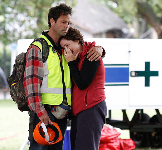 New Zealand Quake: A distraught couple console each other in Christchurch