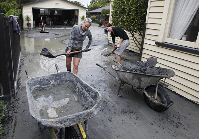 New Zealand Quake: Residents clear mud and silt from their earthquake damaged property