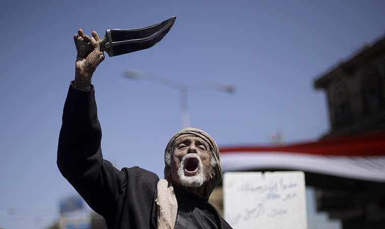 24 hours in pictures: An elderly anti-government protestor in Sana'a, Yemen