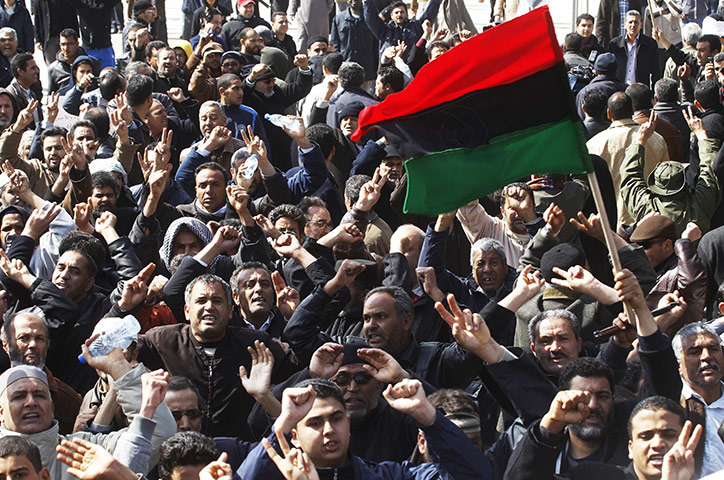 Libya: A crowd of anti-government protesters celebrate taking control of Zawiyah, 30 miles (50km) west of Tripoli 