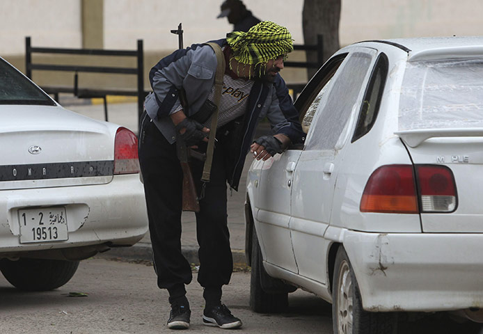 Libya unrest continues: Libyans militias controlling the entrance of the city of Shahad.
