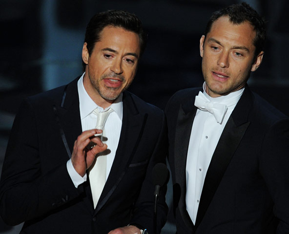 Oscars 2011: winners: Robert Downey Jr and Jude Law 