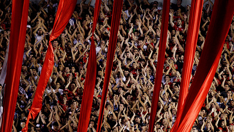 24 hours in pictures: Fans cheer for their team during an Argentine league match
