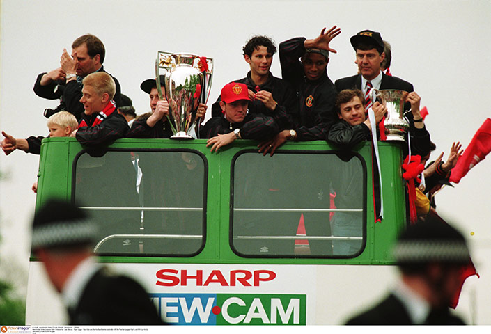 Giggs 20 Years: Ryan Giggs and team celebrate with Premier League trophy and FA Cup trophy