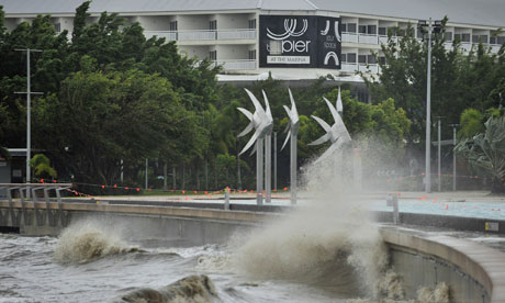 Cyclone Yasi High winds and rain push a swell onto a promenade in Cairns in 