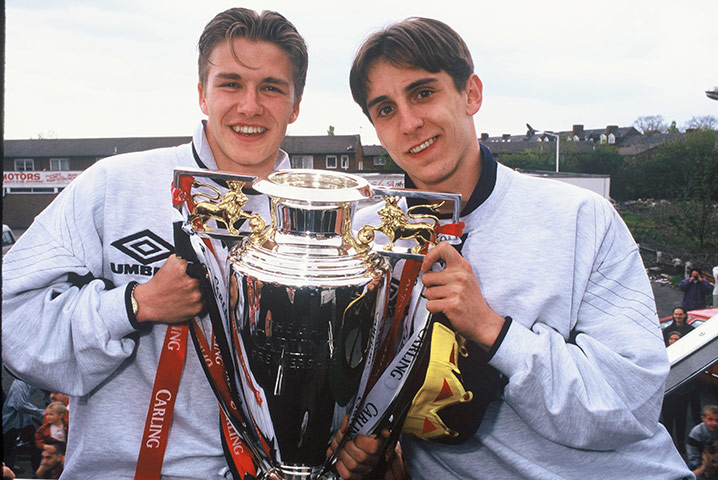 Gary Neville retires: Gary Neville and David Beckham with the Premiership trophy in 1996