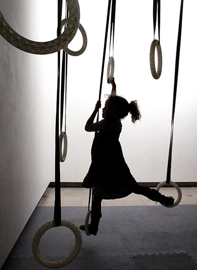 In pictures: play: Girl swinging