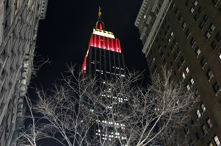 Chinese New Year: The top of the Empire State Building stands lit in red