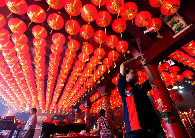 Chinese New Year: Indonesian Chinese residents pray at a temple