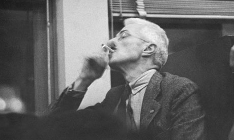 Dashiell Hammett smoking a cigarette