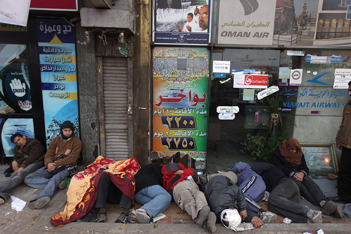 Egyptian Protests: Egyptian anti-government demonstrators sleep at Cairo's Tahrir square