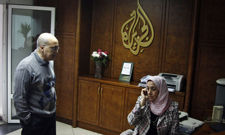 Al-Jazeera staff in their Cairo office before it was ransacked amid the political turmoil in Egypt
