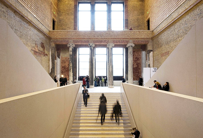 David Chipperfield: Visitors walk up and down the stairs at