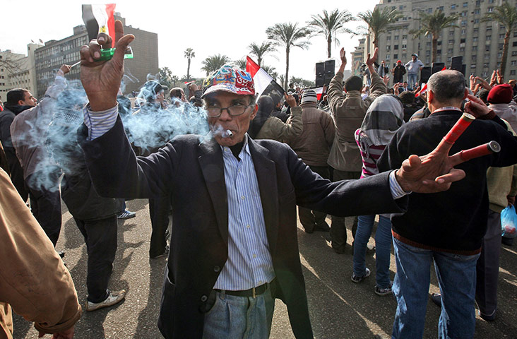 Egypt protests day 13: An anti Mubarak protester takes part in protests