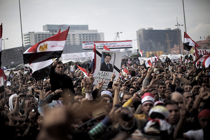 Egypt day 14: Egyptian anti-government demonstrators at symbolic funeral for journalis