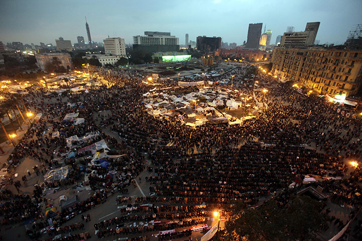 Egypt day 14 update: Egyptian demonstrators camp at dusk in Tahrir square
