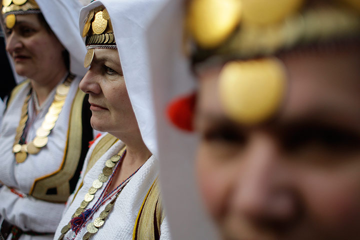 24 hours in pictures: Bosnian women dressed in traditional costumes