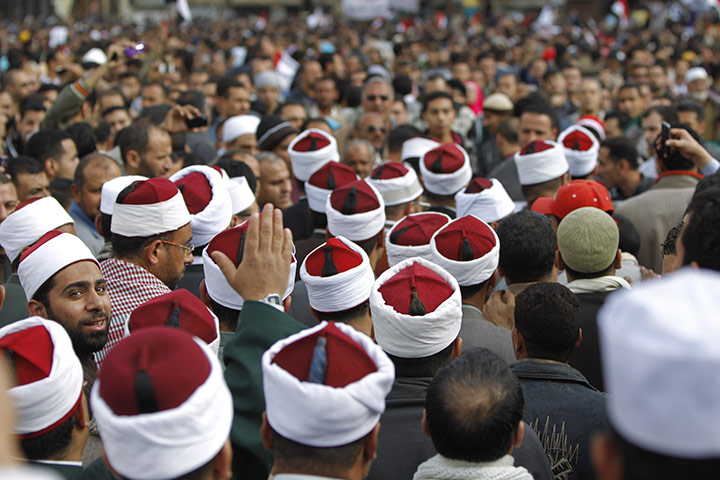 Egypt protests day 15: Egyptian Muslim clerics file through the crowd in Tahrir Square