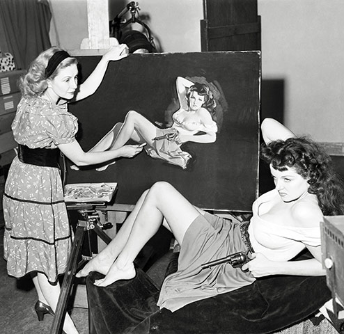 jane russell: Jane Russell poses for  publicity poster for The Outlaw in 1946