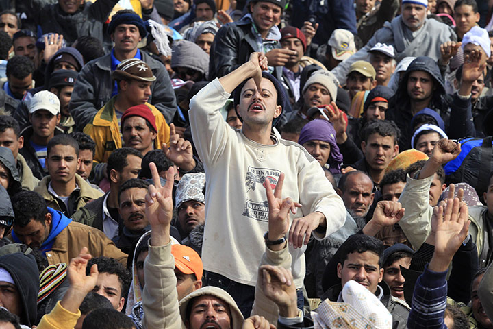 Libya: An Egyptian man fleeing the unrest at the Ras Jdir border crossing