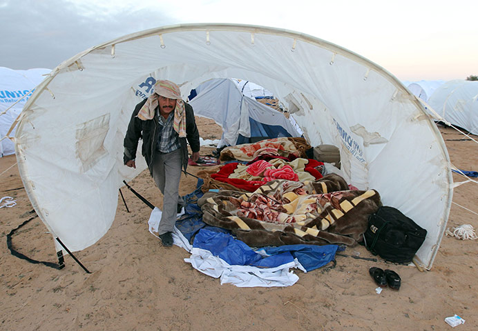 Libya unrest continues: Egyptian refugees flee Libya