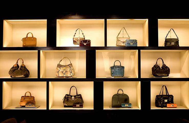 Week in business: Louis Vuitton branded goods sit on display in New Bond Street