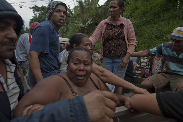 Venezuela Caracas : A family whose house was destroyed in mudslide in Caracas Venezuela