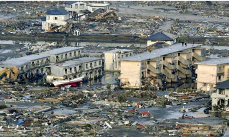 japan tsunami pictures. Japan tsunami: smoke rises