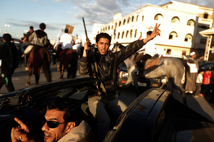 Libya unrest: rebels parade in Benghazi