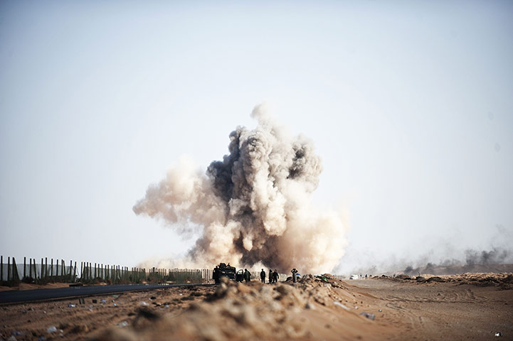 Libya unrest: Libyan jet fighter bomb