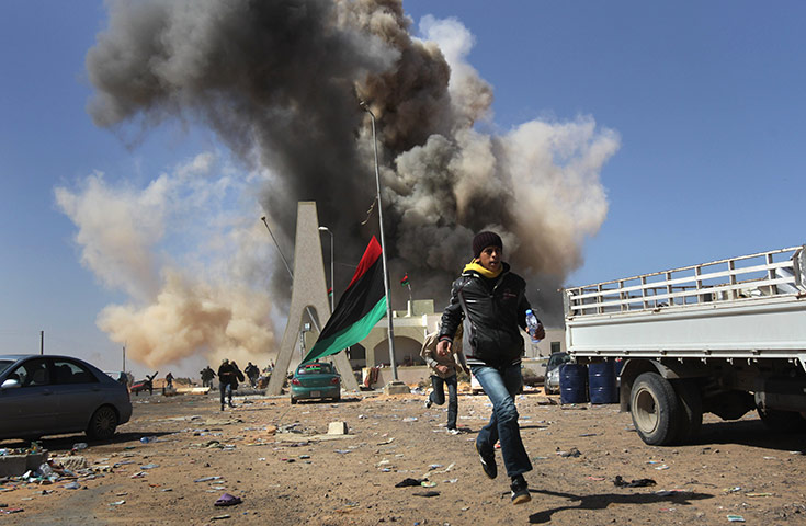 Libya unrest: rebels run for cover