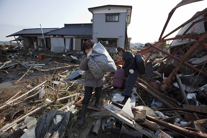 Dan Chung in Japan: Locals salvage belongings from tsunami and earthquake damaged buildings