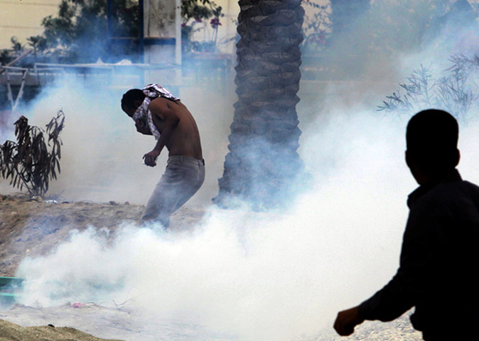 24 hours in pictures: An anti-government protester in Manama, Bahrain
