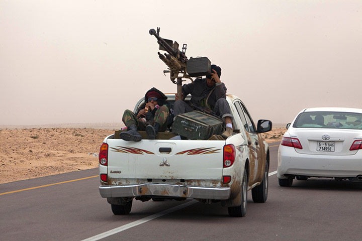 sean smith in libya: Rebel militia withdraw from the area around Brega 