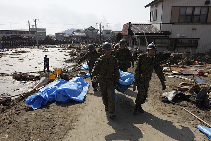 Dan Chung in Japan: Rescue workers recover bodies