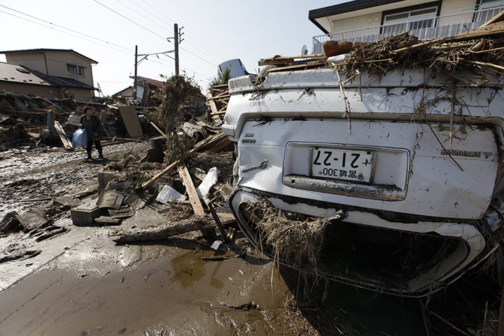 Dan Chung in Japan: An overturned vehicle in the debris