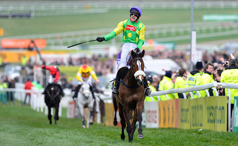 Cheltenham Retrospective: Cheltenham Gold Cup. Ruby Walsh on Kauto Star crosses the winning line