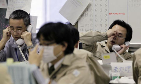 Japan nuclear crisis: workers at the disaster response headquarters in Fukushima, northern Japan