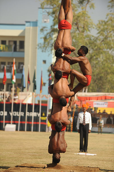 24 hours in pictures: Indian infantry soldiers display their malkhamb skills 
