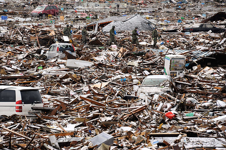 japan disatster: Japanese Self-Defence Force soldiers look for survivors in Natori