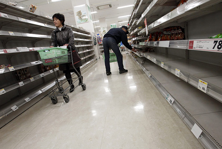japan disatster: People shop for food from almost  supermarket in Tokyo