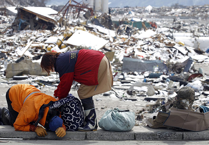 24 hours: Otsuchi, Japan: Survivors react after collecting their belongings